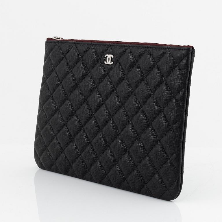 Chanel, a black caviar leather clutch, 2020.