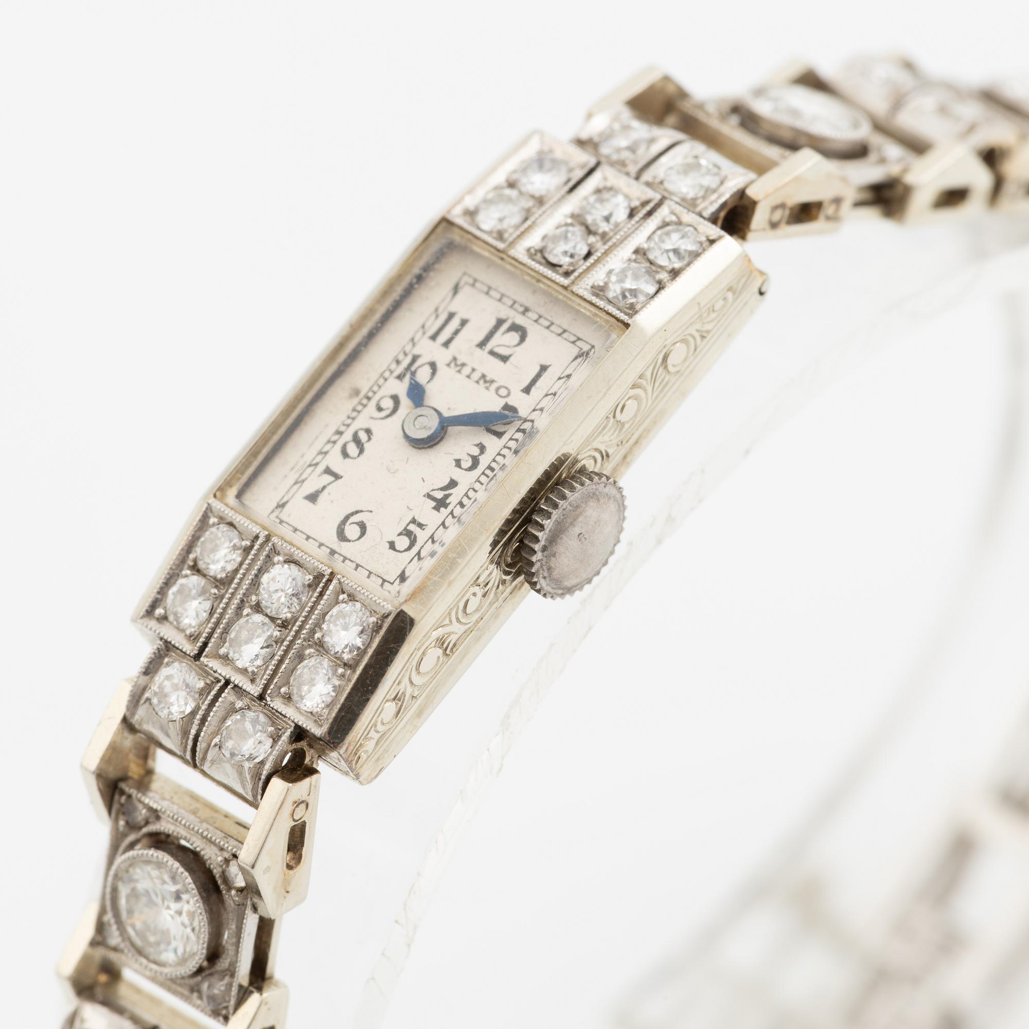 Armbandsur, art déco, länk 18K vitguld med briljantslipade och gammalslipade diamanter, K& KC Göteborg 1941.