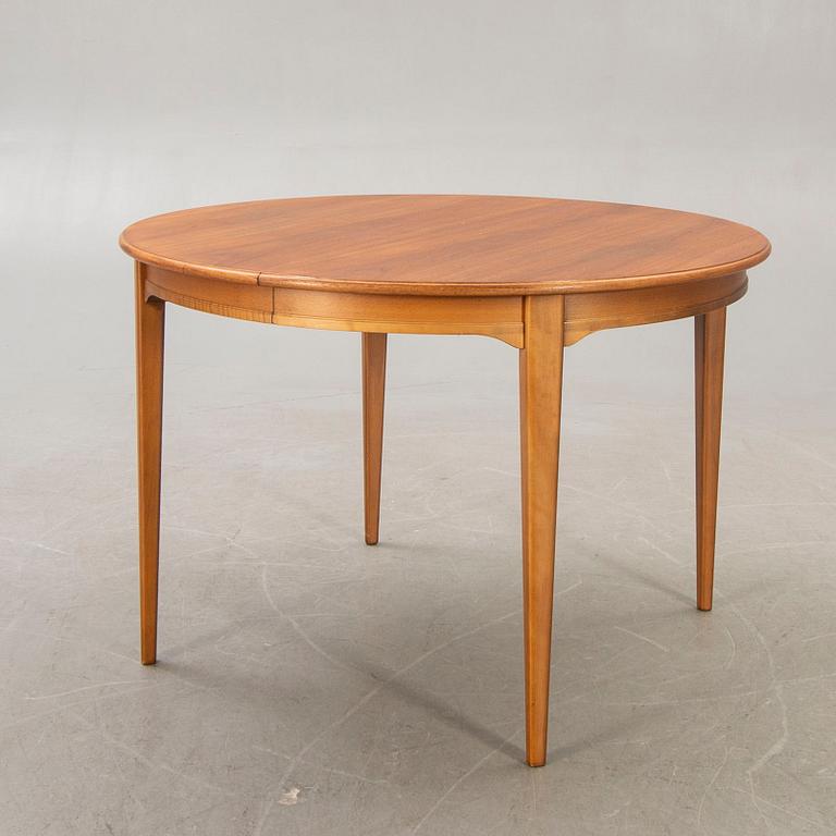 A 1960s Svante Skogh walnut dining table.