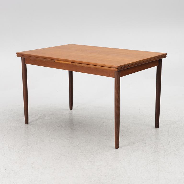 A dining table, 1950s/60s.