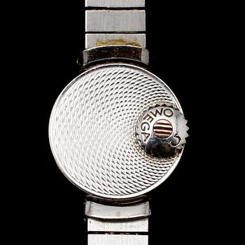 ARMBANDSUR, Omega, 18 k vitguld, med 6 briljantslipade diamanter, 1900-talets mitt. Total vikt med urverk 33 gram.
