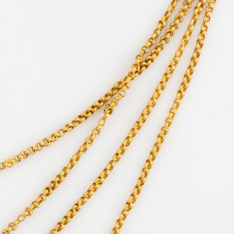 Long gold chain.