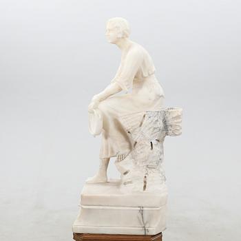 Decorative sculpture Seated woman with tambourine.