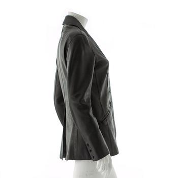 HERMÈS, a black leather suit jacket.