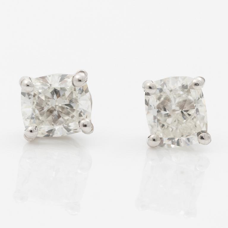 Earrings, a pair, 18K white gold with cushion-cut diamonds totalling 1.00 ct.