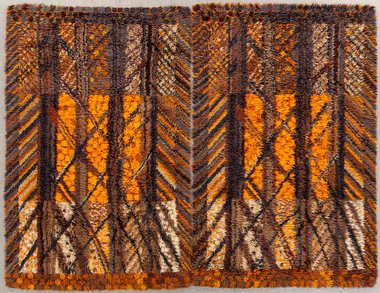 A pair of machine made long pile rugs ca 190 x 137 cm each.