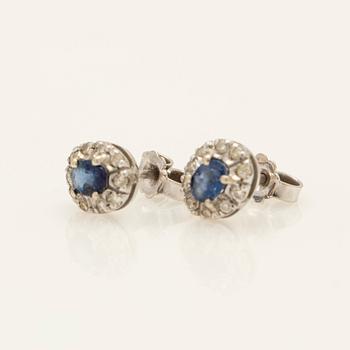 Earrings, a pair, 18k white gold with brilliant-cut diamonds and sapphire.