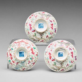 A set of three famille rose covers, Qing dynasty with Qianlong mark.