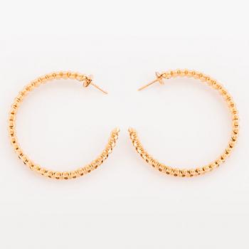 A pair of Cartier "Clash de Cartier" 18K gold hoops.