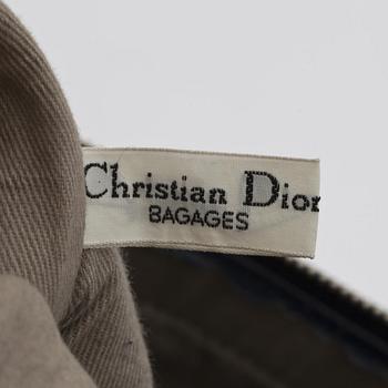 CHRISTIAN DIOR, a blue monogrammed canvas handbag.