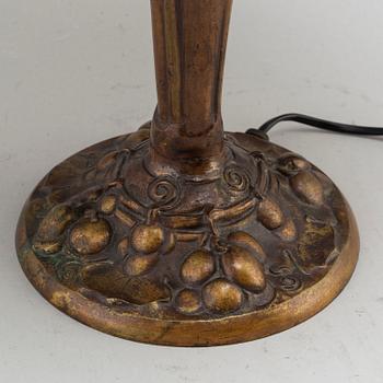 An early 20th Century art noveau bronze table lamp.