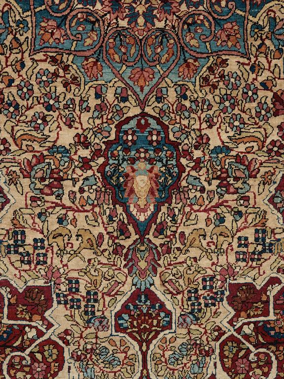 A RUG. An antique Esfahan. 212 x 141 cm.