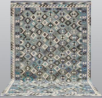 A Kilim carpet, ca 290 x 199 cm.