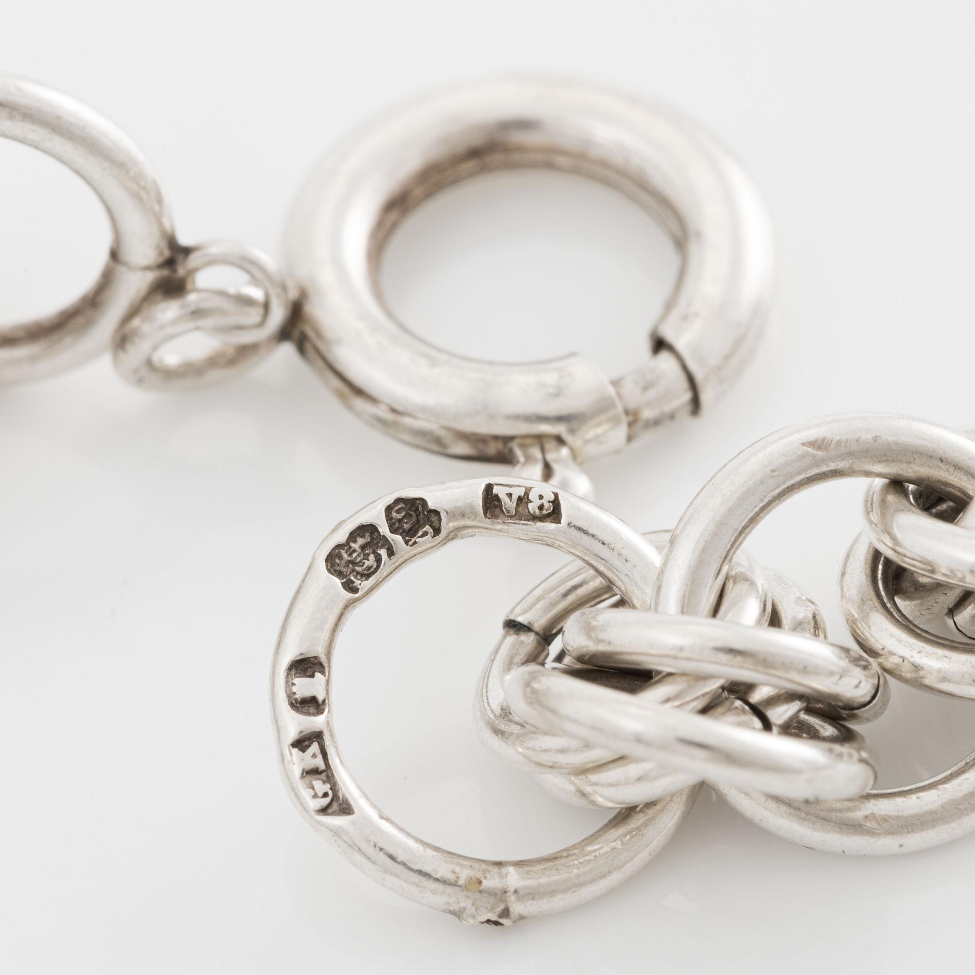 Silver necklace.
