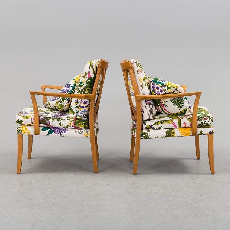 A pair of Norell easy chairs, 20th century.