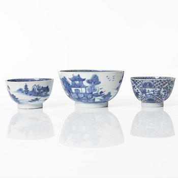 A Chinese blue and white jug, an ewer and three cups, Qing dynasty, Qianlong (1736-95).