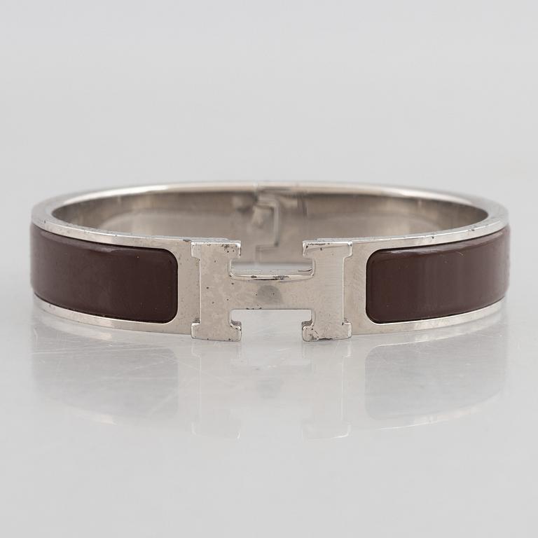 Hermès, a 'Clic H' bracelet.