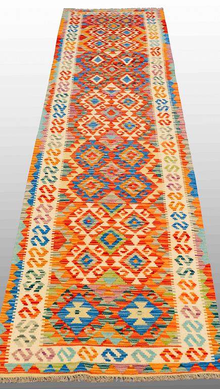 A RUNNER Kilim, ca 300 x 77 cm.