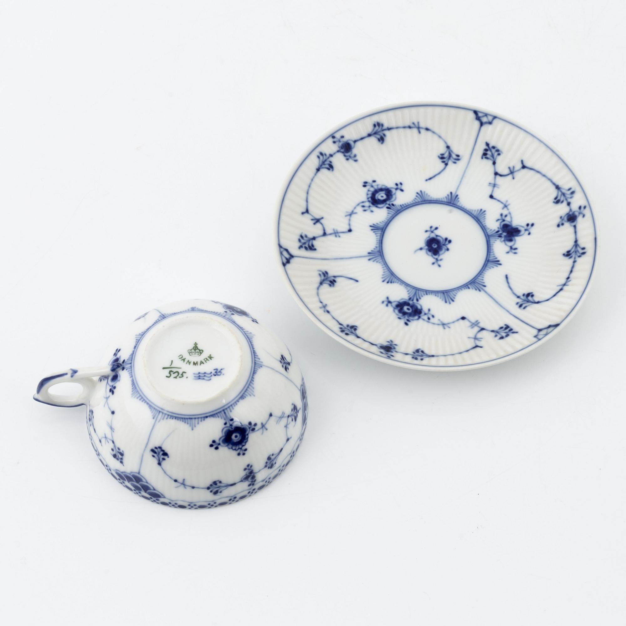 A 24-piece 'Musselmalet' tea service, Rifflet and half lace, Royal Copenhagen, Denmark.
