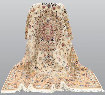 A carpet, Tabriz, ca 385 x 247 cm.