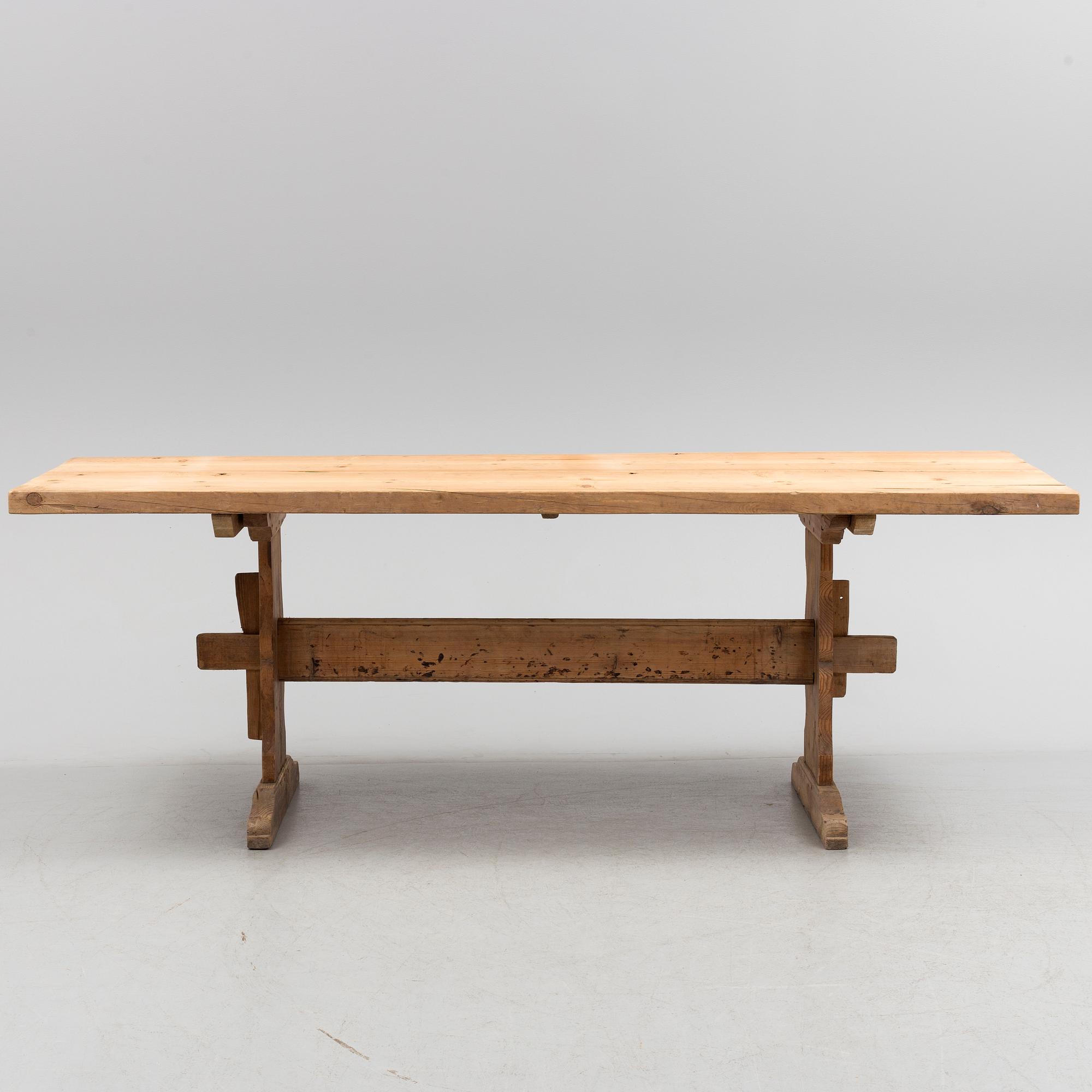 A 19th/20th century pinewood table.