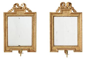 Two matched Gustavian one-light girandole mirrors by J. Åkerblad.