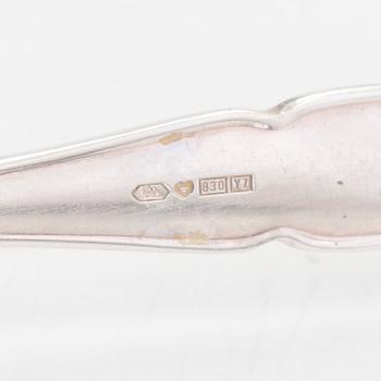 A 78-piece silver 'Chippendale' cutlery set, 1978-2007. Various Finnish manufacturers.