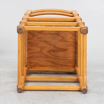 A set of eight pine chairs with new sheepskin upholstery, 1970s.