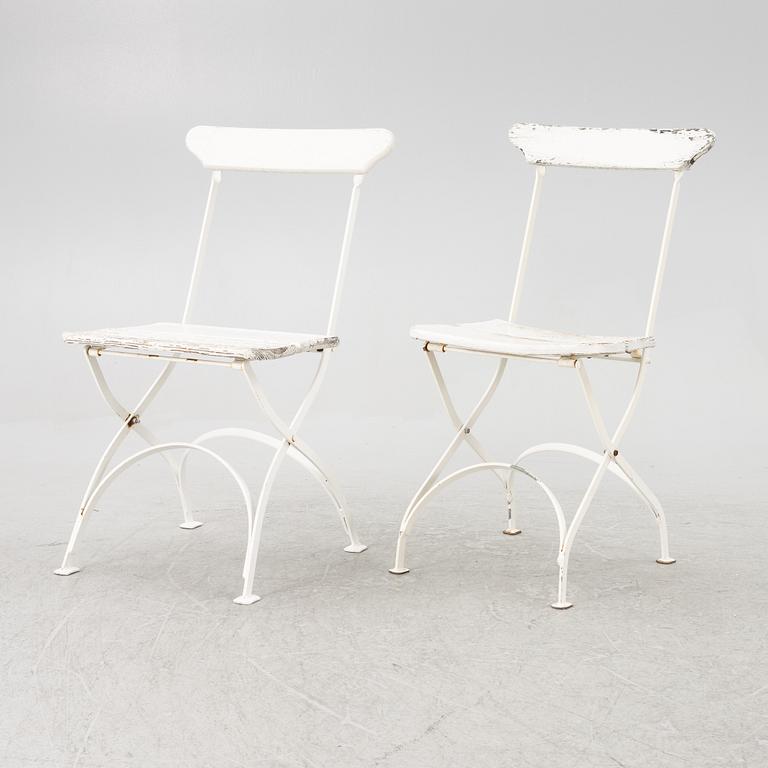 A set of seven garden chairs and two tables Byarums bruk, later part of the 20th century.