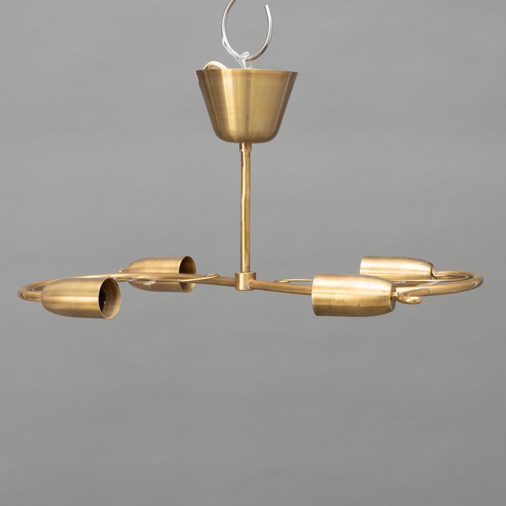 A brass ceiling lamp, marked K&H, Norway, mid 20th century.