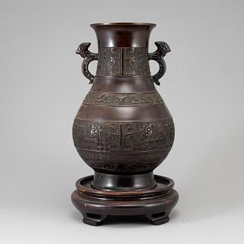 A bronze vase,  Japan, early 20th Century. After a Chinese archaic bronze model.