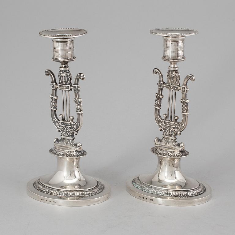 A pair of Swedish empire silver candlesticks by Adolf Zethelius, Stockholm 1826.