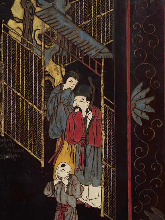 A Chinese four panel lacquer folding screen, first part of the 20th century.