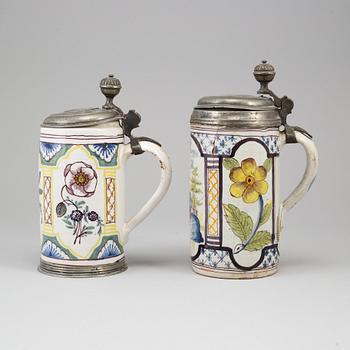 Two pewter mounted faience tankards, Germany, 18th century..