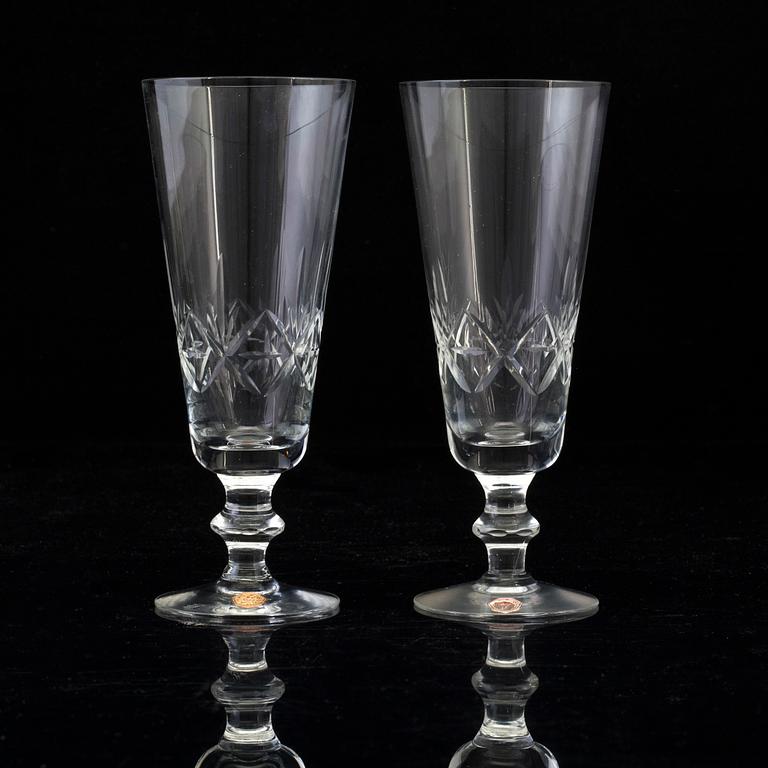 A set of twelve mid 20th century champagne glasses by Sea Glasbruk Kosta.