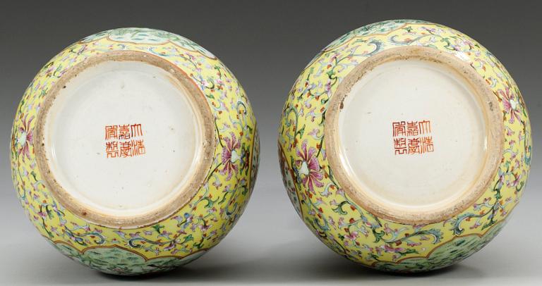 A pair of yellow ground vases, late Qing dynasty. With seal mark. (2).