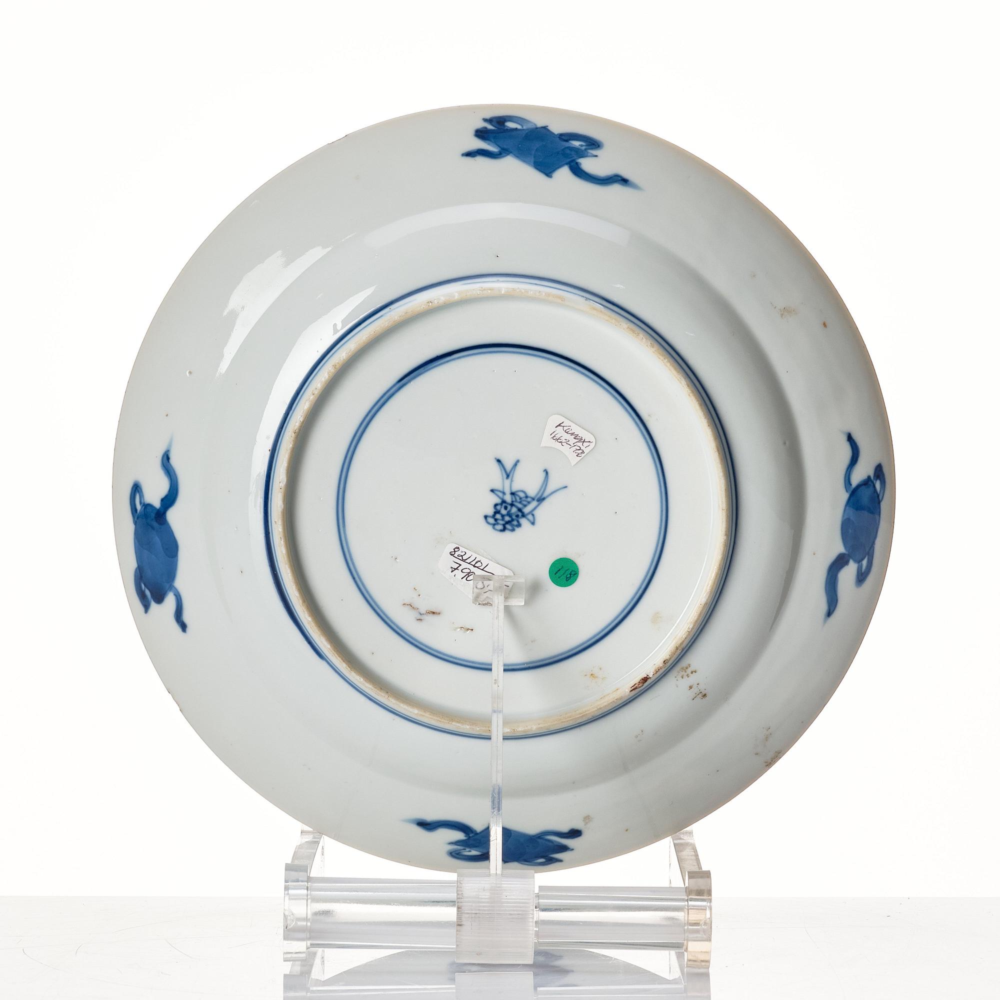 A set of four blue and white dinner plates, Qing dynasty, Kangxi (1662-1722).