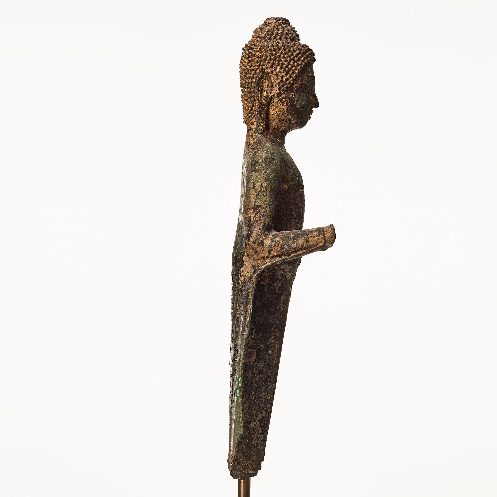 A standing figure of Buddha, Thailand, 18th Century.
