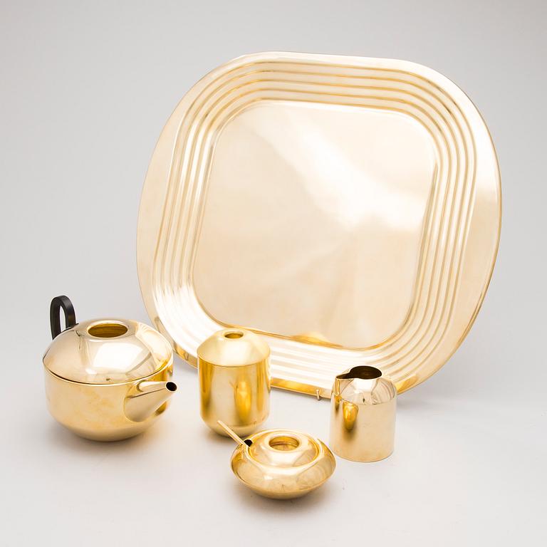 A 5-piece 'Eclectic' brass set for tea.