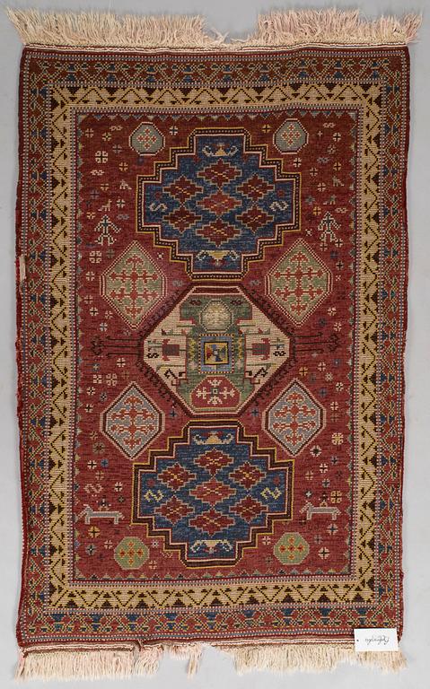 A 1940's Spanish rug Of Kazak design, ca. 139 x 93 cm.