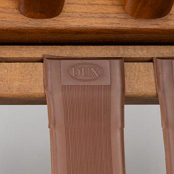 Folke Ohlsson, a pair of 'USA 75' armchairs, Dux, Sweden, 1960's.