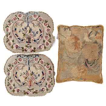 CUSHIONS, 3 pcs., one rectangular in tapestry weave, two oval embroidered, ca 51,5 x 42 cm, ca 38,5 x 45,5 cm each,