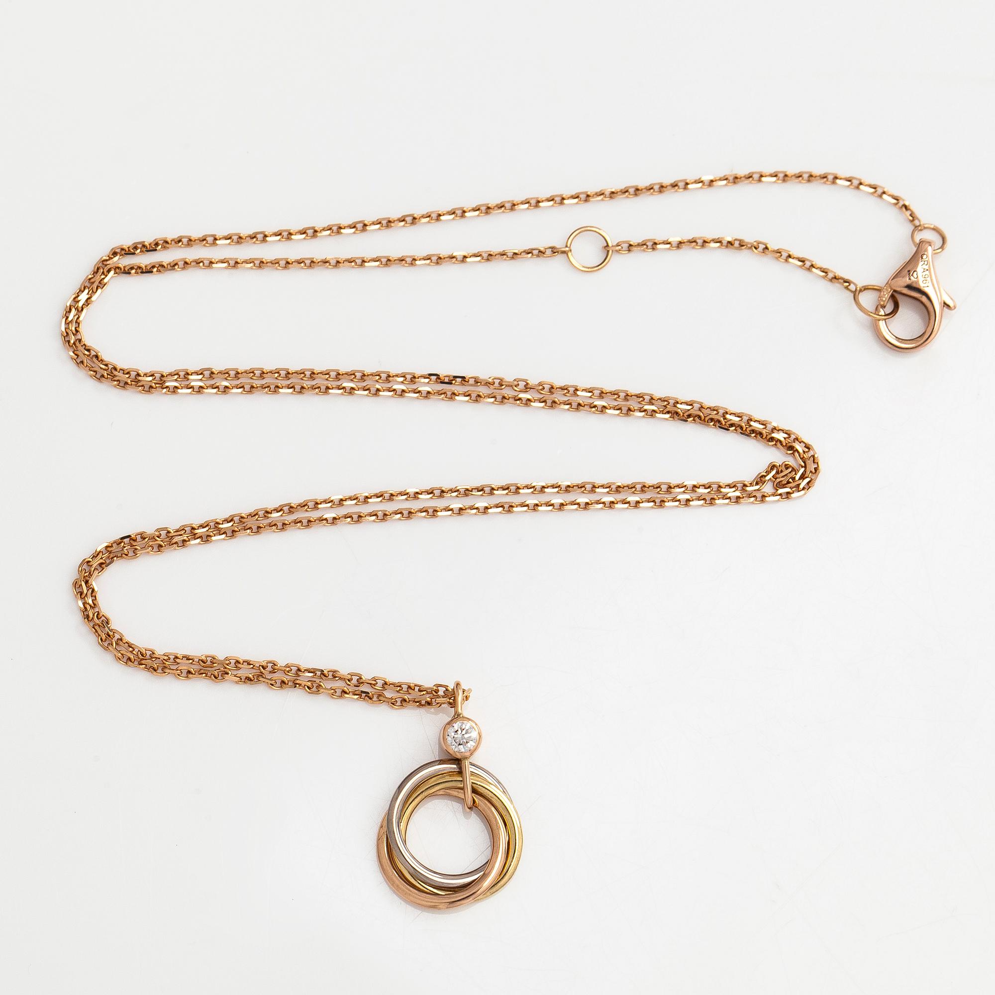 Cartier, halsband, "Trinity Pendant", 18K guld och en briljantslipad diamant.