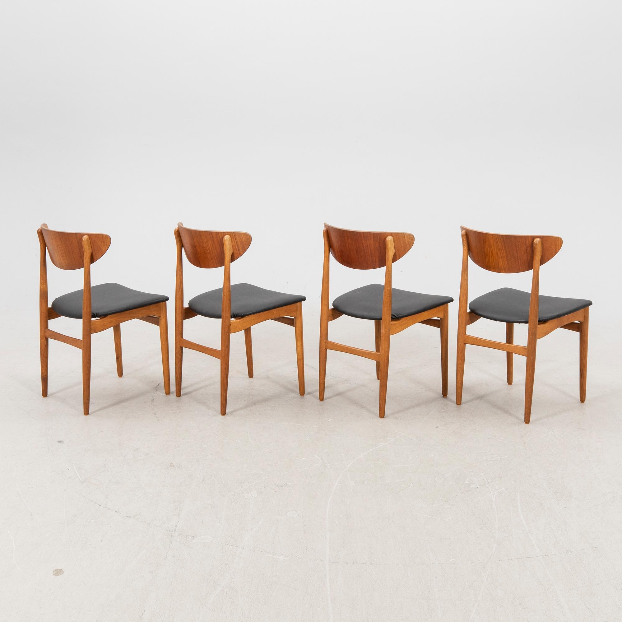 A set of four Danish teak 1960s chairs.