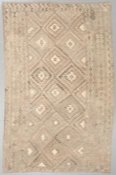 A kelim rug, 262 x 168 cm.