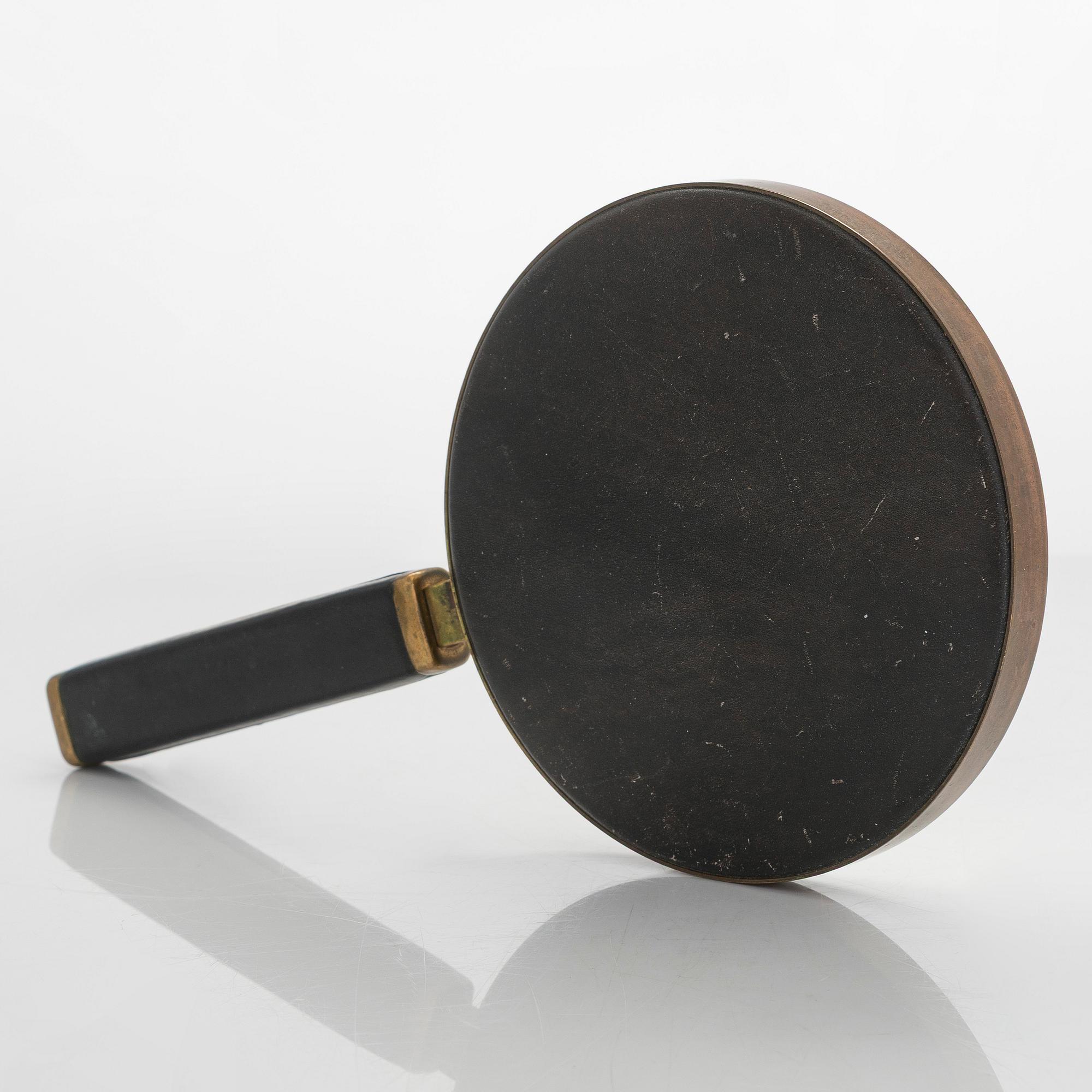 Maija Heikinheimo, A 1960s hand mirror for Valaistustyö, Finland.