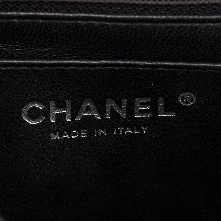 A black lacquer "Classic mini" bag by Chanel 2009-2010.