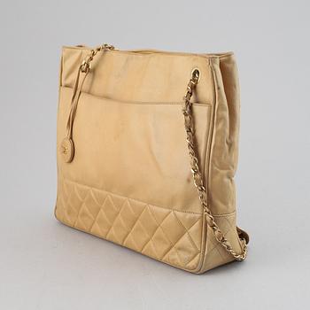 Chanel, a beige leather handbag, 1986-1988.
