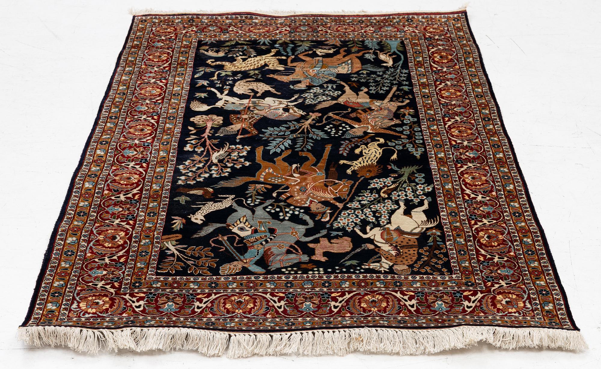A Kashmir silk rug, c. 168 × 102 cm.