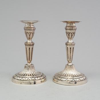 A pair of late 18th century silver candlesticks with unclear hallmarks, possibly from Germany. Weight ca 316 grams.